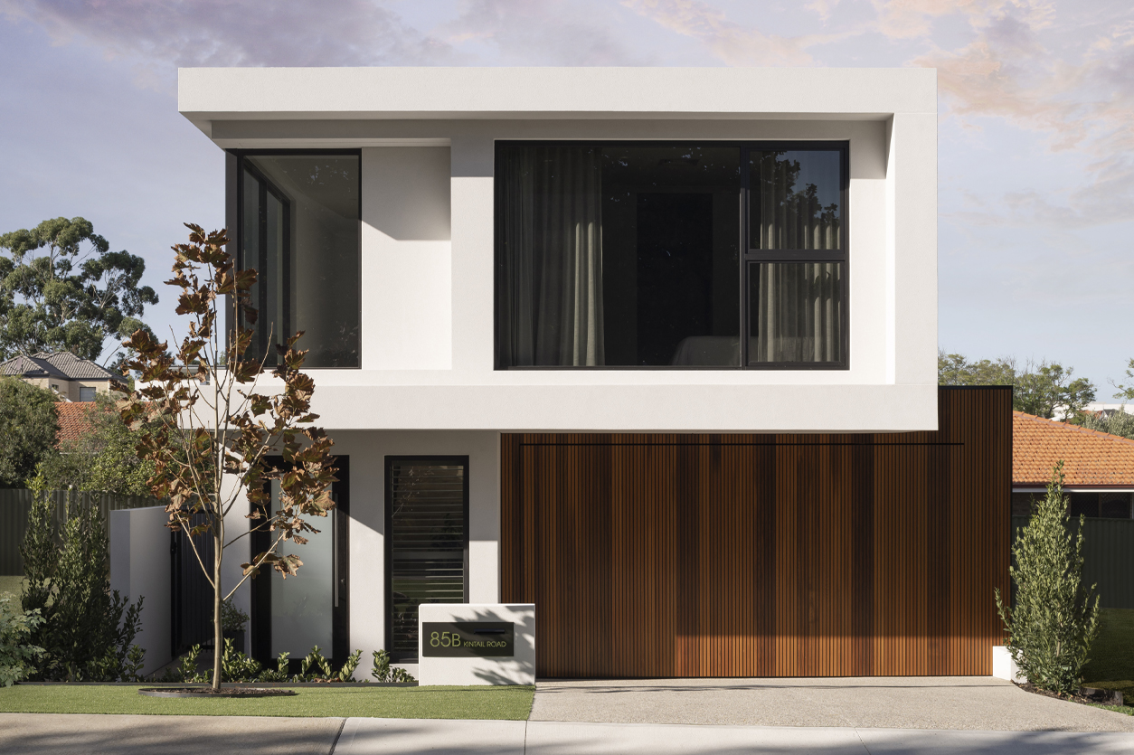 luxury-home-builder-in-applecross-perth-e1621989246774 (1) (1) A beautiful home located in applecross with open windows and a wooden feature garage